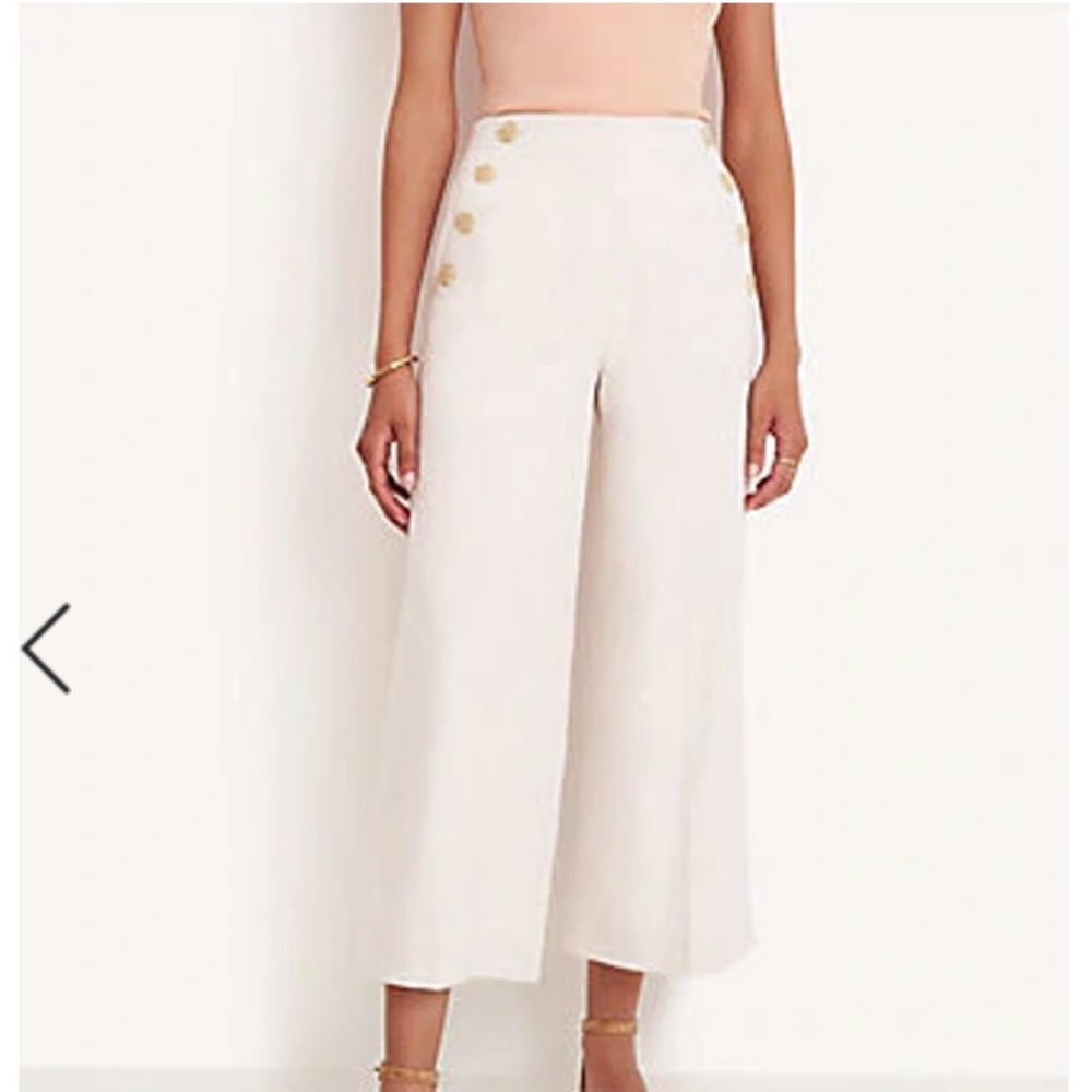 Tan work pants. Cropped
